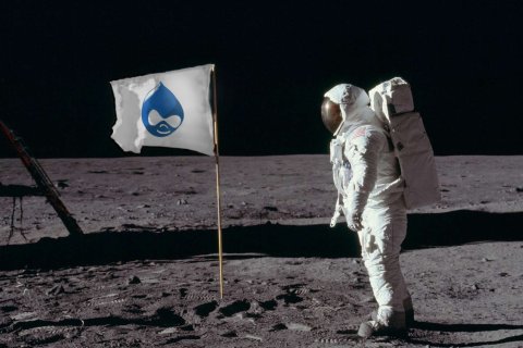 cosmonaut on the moon with the drupal flag
