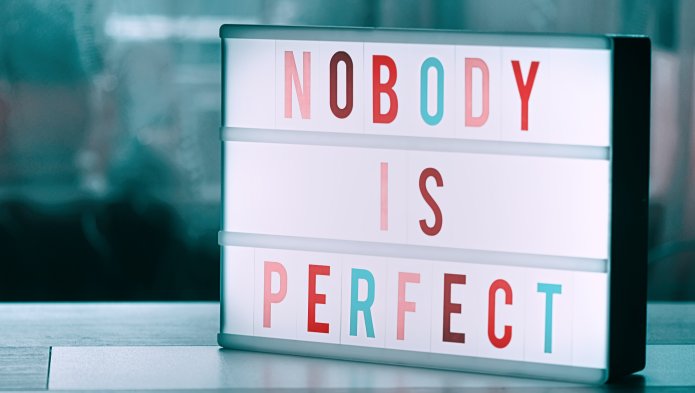 Luminous frame where it says “nobody's perfect”.