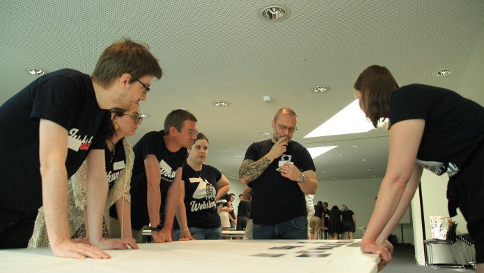 Webstanz team making the climate mural